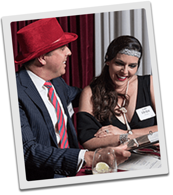 Seattle Murder Mystery couple checking out the dinner menu